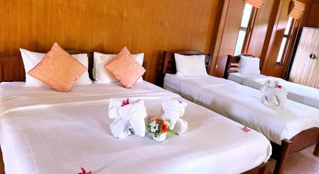 Кровать в общем номере Doo Dee Boutique Resort by Swiss Chalet
