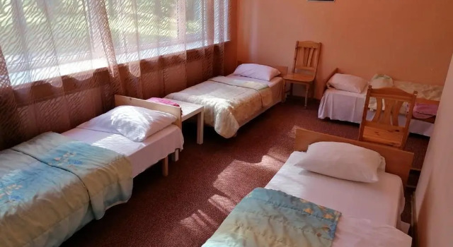 Кровать в общем номере Minhauzena Unda