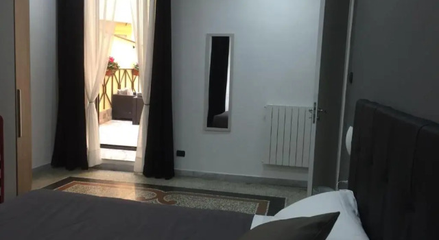 Четырёхместный номер Standard MB95 - Mezzocannone Luxurious Bed&Breakfast