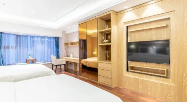 Кровать в общем номере с видом на море Xilaide Seaview Apartment Hotel