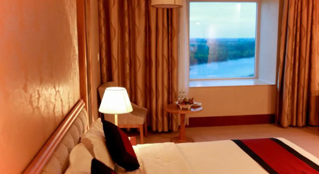 Двухместный номер Deluxe с видом на реку Sai Gon Dong Ha Hotel - a member of Saigontourist Group