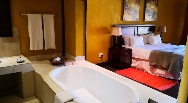 Номер Executive с балконом Riverstone Lodge