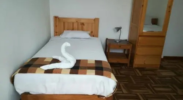 Qente, Hospedaje Familiar