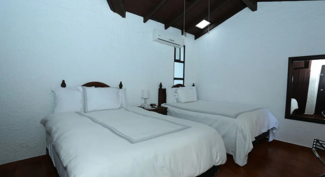Четырёхместный номер Deluxe Hotel Casa Colonial Boutique