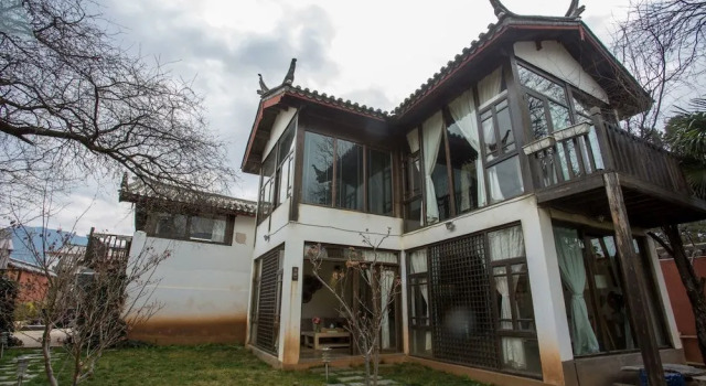 Yunzhong Baisha Lijiang Inn, Prenota Hotel Baisha Yunnan