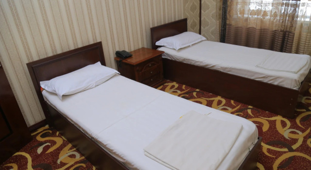 Четырёхместный люкс Dangara Grand Hotel