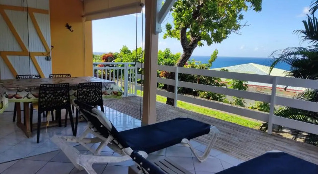 Апартаменты Bungalow with sea view in Deshaies