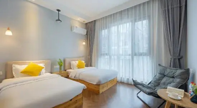 Кровать в общем номере Floral Hotel·Yige Guesthouse Wuyuan Hotel (Likeng Scenic Area)