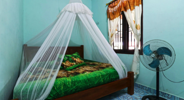 Fadhil Guest House Bukit Lawang RedPartner, Book Pension Hoteller i Bukit Lawang med parkering, Parkering