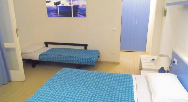 Standard Vierer Zimmer mit Gartenblick Hotel Capo Sud
