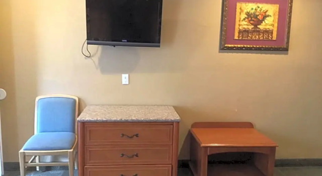 Четырёхместный номер Standard Bevonshire Lodge Motel