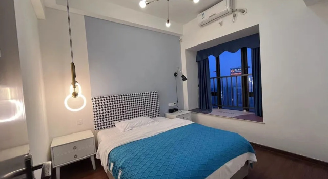 Номер Deluxe Yi Long International Apartment