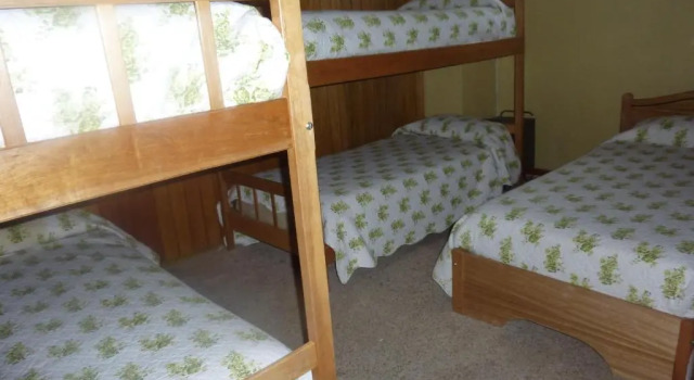 Кровать в общем номере Hostel Danicar Puerto Natales