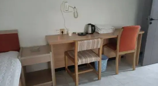 Кровать в общем номере Fuju Hotel, South Fujian