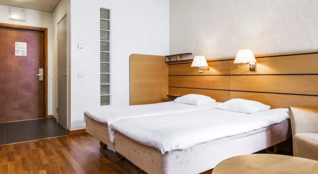 Одноместный семейный номер Standard с балконом Imatran Kylpylä Spa Apartments