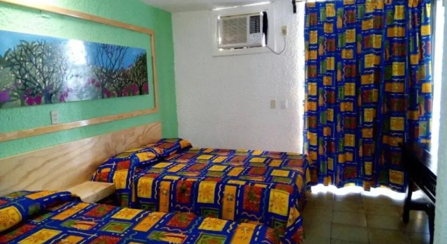 Standart altı kişilik oda Canadian Resort Acapulco Diamante