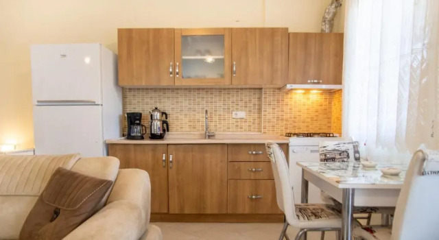 Апартаменты Lovely Flat With Balcony in Cesme Close to Sea