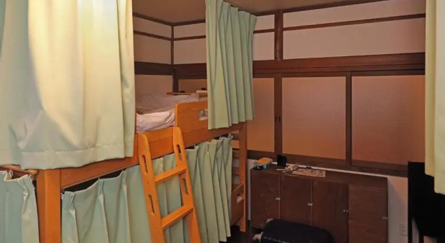 Кровать в общем номере Guesthouse KYOTO COMPASS