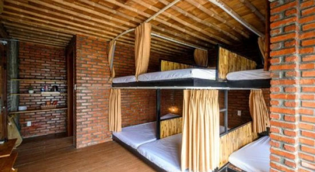 Кровать в общем номере Mira Bãi Xếp Quy Nhơn - The Hidden Jewel