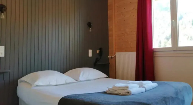 Четырёхместный номер Standard с балконом Hôtel Les Mouflons