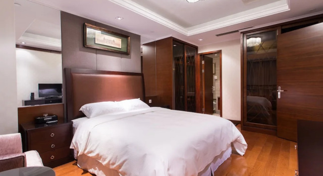 Люкс Deluxe с 3 комнатами с видом на город Qingdao Jinshan We Holiday Apt Wusi