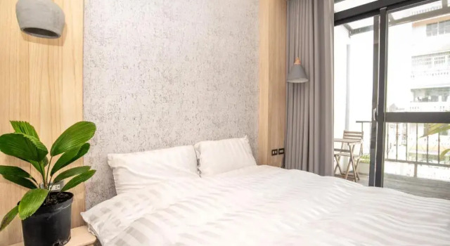 Двухместный номер Standard с балконом Yiyue Guanhe Homestay 倚月觀荷民宿