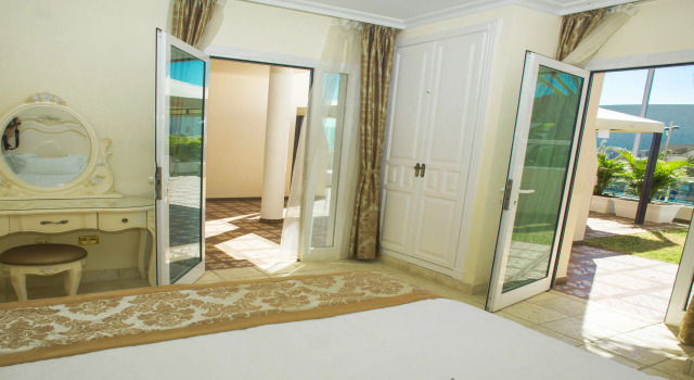 Flamingo Suites Boutique Hotel, Забронировать Бутик-отель Бутик-отели Адехе, рядом с Центр водных видов спорта Tenerife Nautical Center, Бутик-отель