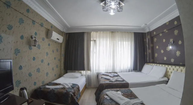 Трёхместный номер Standard Grand Esen Hotel