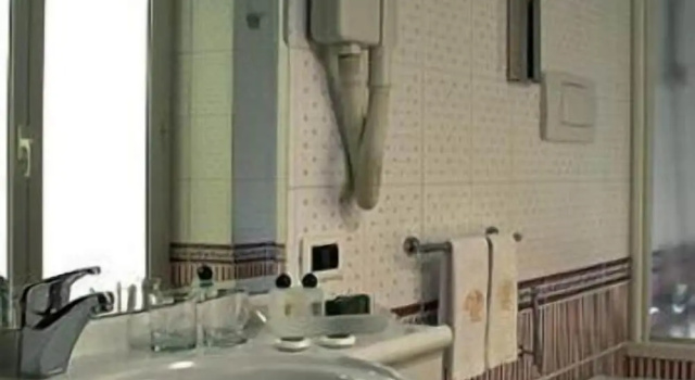 Четырёхместный номер Deluxe Colonna Hotel