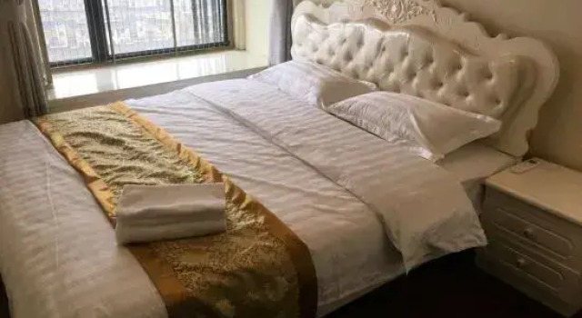 Qidong Yuelai Holiday Homestay, Prenota Hotel Hotel a Jiangsu con parcheggio, Parcheggio