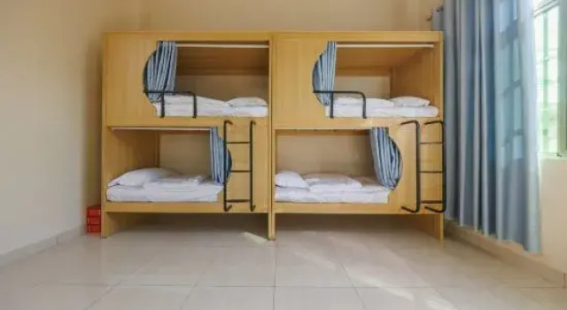 Кровать в общем номере (мужской номер) Chujian homestay
