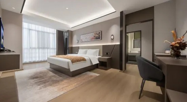 Семейный люкс Yuekelai Hotel Ruili