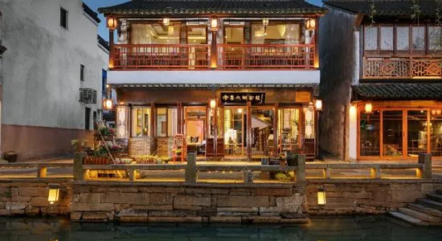 Qianshe Mengli Shuixiang Linhe Inn, Забронировать Отель Сучжоу Китай