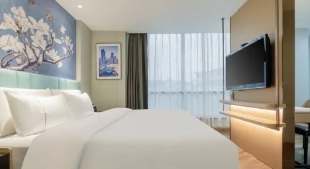 Люкс Deluxe Magnotel Hotel (Ezhou Yintai Baihuo Nanpu Road)