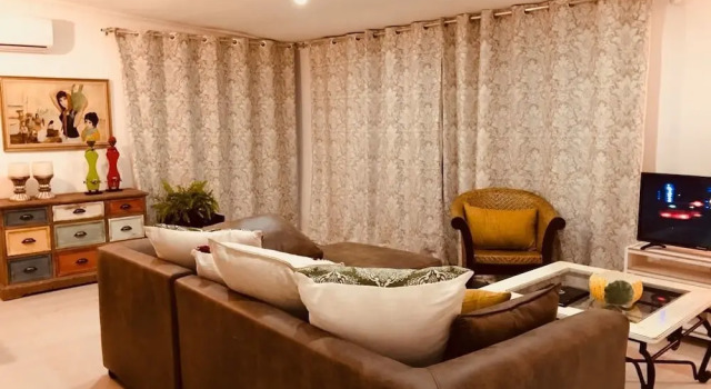 Апартаменты American Style Guesthouse