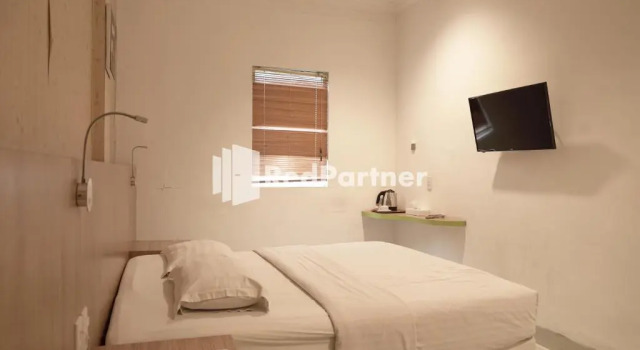 Двухместный номер Deluxe Wisma Sederhana Medan Mitra RedDoorz