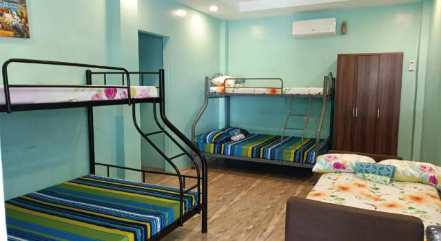 Кровать в общем номере Azulea Lodging House Oslob