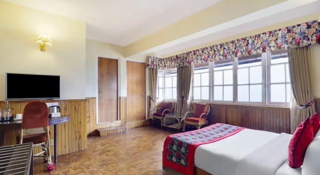 Premium triple chambre avec balcon Summit Newa Regency