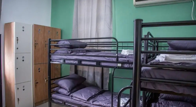 Cama en dormitorio compartido frente a la playa Hostel BU93