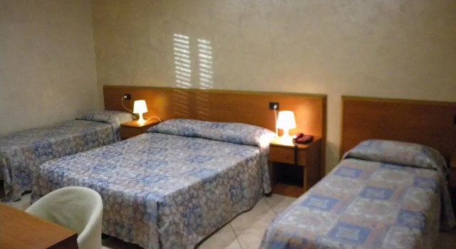 Standard Vierer Zimmer Hotel Toscano