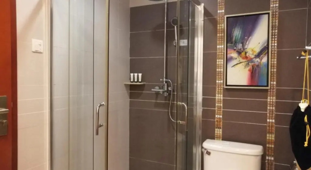 Номер Superior Haikou Mingguang Shengyi Hotel