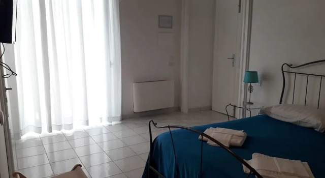Трёхместный номер Standard с балконом Residenza depoca Olimpia