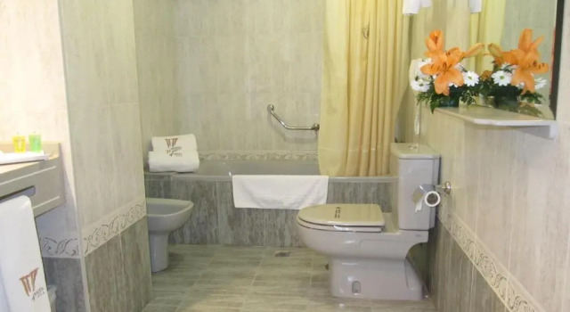 Трёхместный номер Hotel Sercotel Cuatro Postes