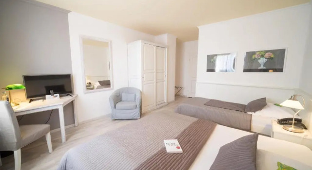Трёхместный номер Comfort Hotel Toskana