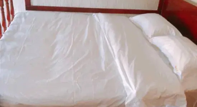 Кровать в общем номере Fulin Express Hotel (Mudanjiang East 2nd Branch)