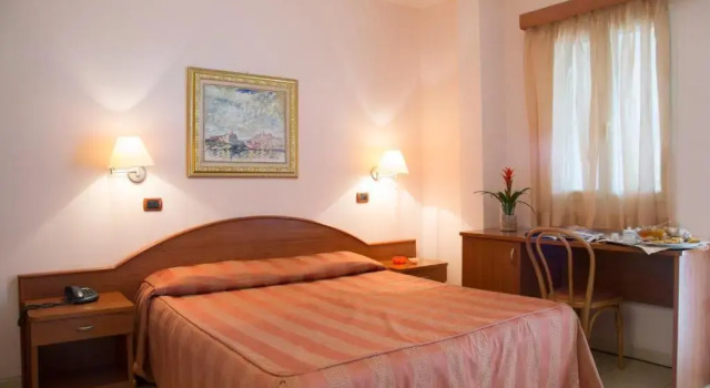 Четырёхместный номер Standard с патио Garden Hotel Ripa