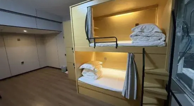 Кровать в общем номере (женский номер) Moshan Hostel (Baoguosi, Emei Mountain)