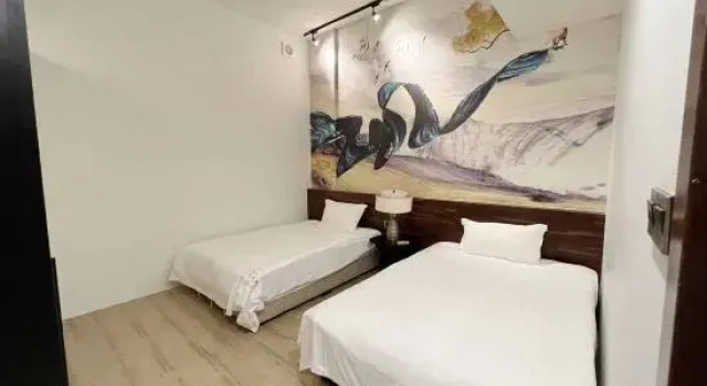 Трёхместный люкс с 2 комнатами с видом на море Baoli JintinShanwei Bay Dongyue Boyang apartment