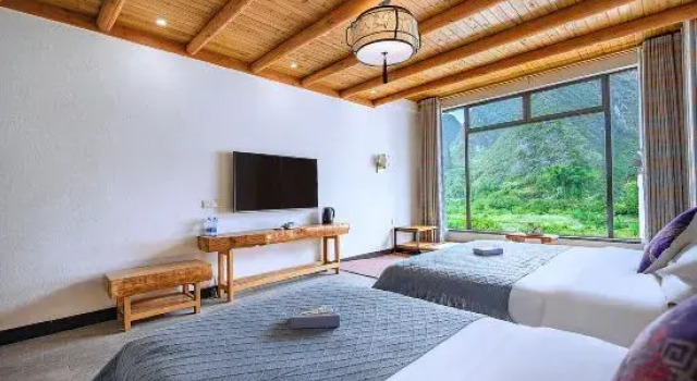 Семейный люкс с 3 комнатами Qingju Caotang Homestay (Yangshuo Yulong River Jima Wharf Branch)