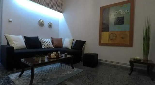 Апартаменты Цокольный этаж 73sq Apt near Athens and Piraeus port with backyard